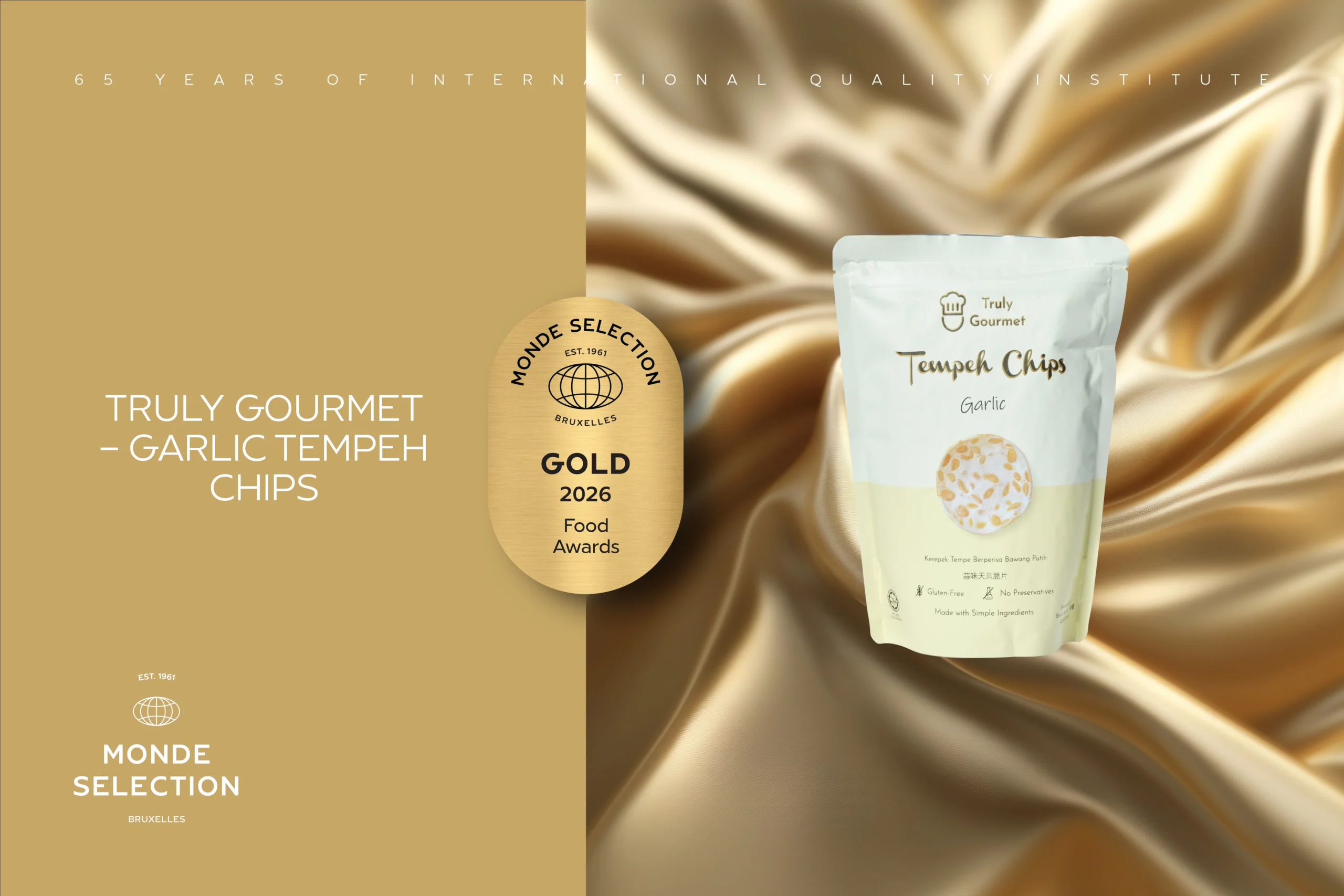Monde Selection Gold 2026 Food Awards badge Truly Gourmet Garlic Tempeh Chips pack beside the Monde Selection Gold 2026 Food Awards badge